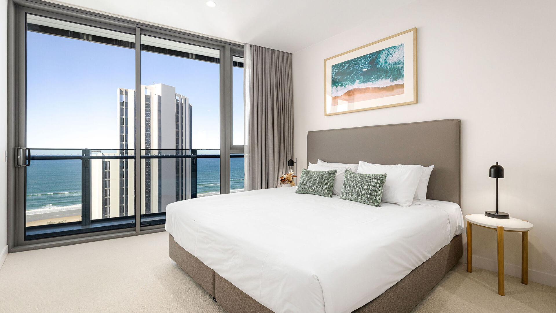Bedroom with ocean views in 2 Bedroom Ocean View Suite Premium at ULTIQA Signature at Broadbeach.