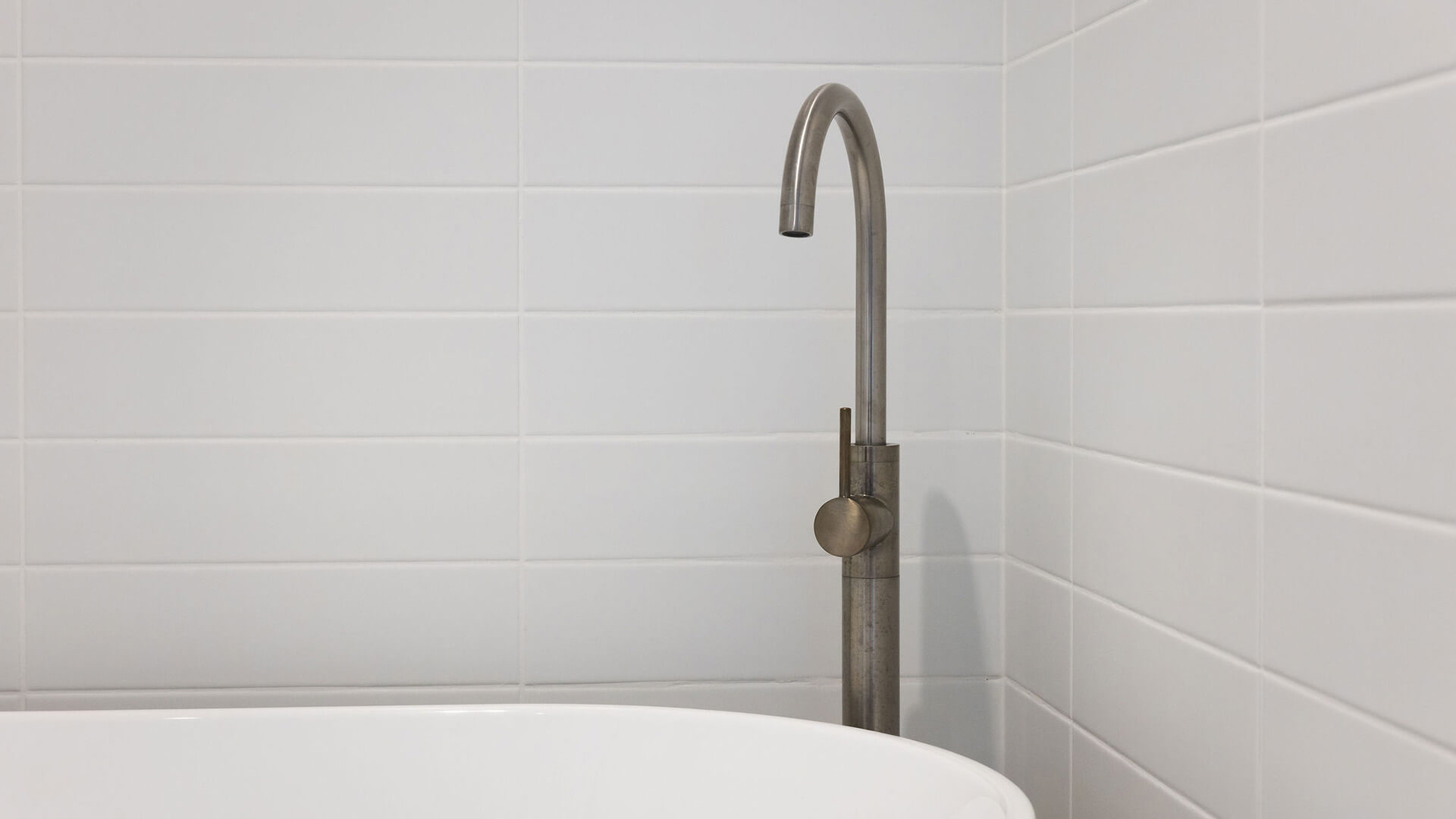 Close-up of bathtub tap in 2 Bedroom Ocean View Suite Premium at ULTIQA Signature at Broadbeach.