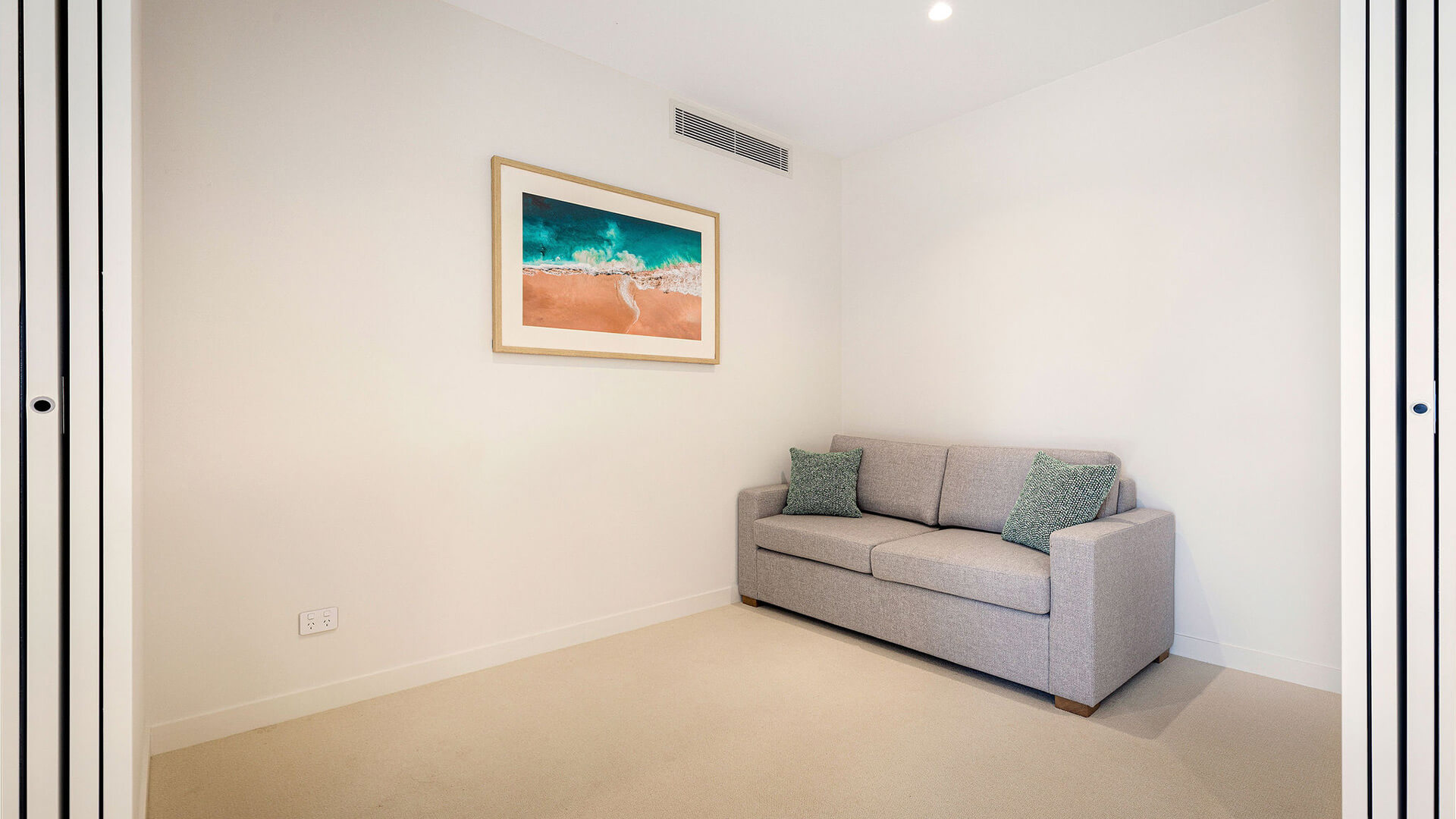 Sofa bed in study area of 2 Bedroom Ocean View Suite Premium at ULTIQA Signature at Broadbeach.