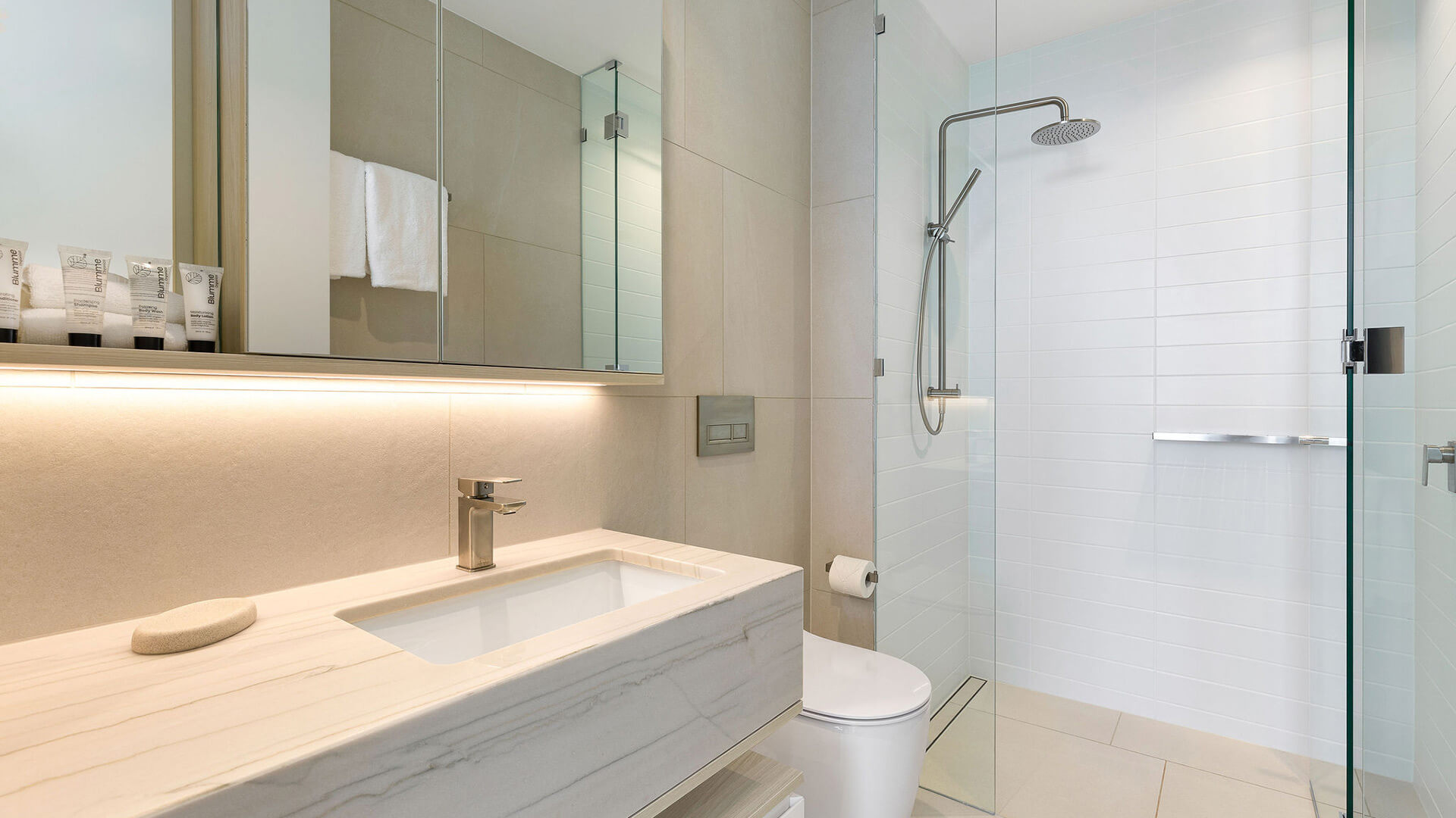 Bathroom in 3 Bedroom Ocean View Suite at ULTIQA Signature at Broadbeach with walk-in shower.